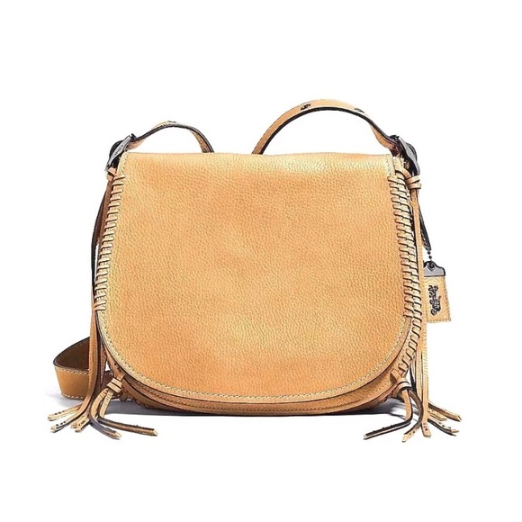 coach fringe saddle bag